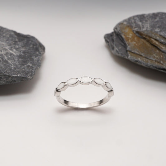 Silhouette Keepsake Ring in sterling silver with a sleek design and marquise-shaped custom semen inlays for a bold yet minimalist look.