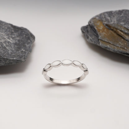 Silhouette Keepsake Ring in sterling silver with a sleek design and marquise-shaped custom semen inlays for a bold yet minimalist look.