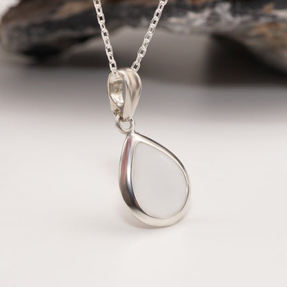 Sterling silver teardrop pendant with polished finish and custom semen inlay, bold intimate jewellery for a daring statement.